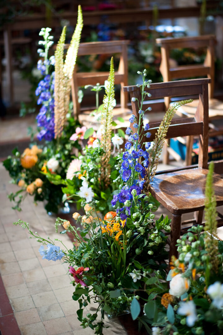 Meadow Flowers Colourful Pew End Wedding Rachael Connerton Photography