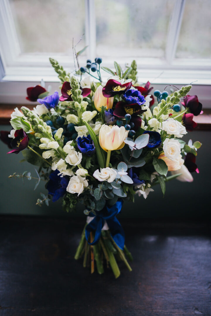 Winter Wedding Flowers Bouquet Red White Blue Becky Weir Photography