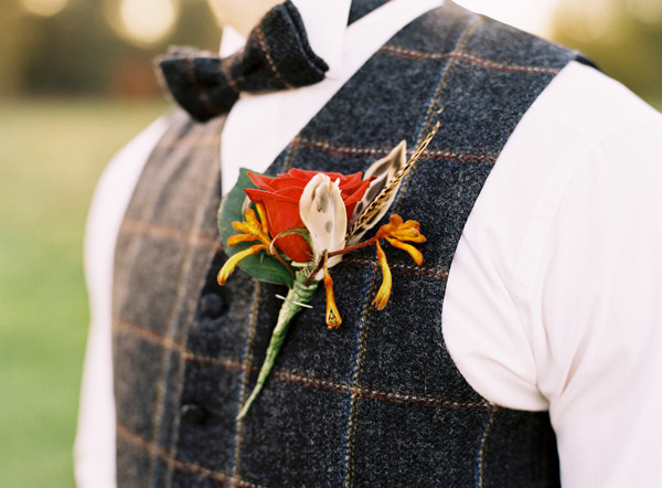 Christmas Buttonhole Feather Rose Rustic Christmas Wedding Ideas http://www.victoriaphippsphotography.co.uk/