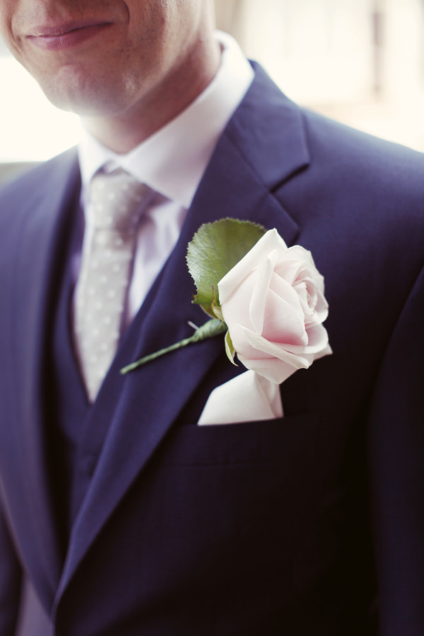 Lavender Farm Tipi Wedding Rose Buttonhole http://www.rebeccaweddingphotography.co.uk/