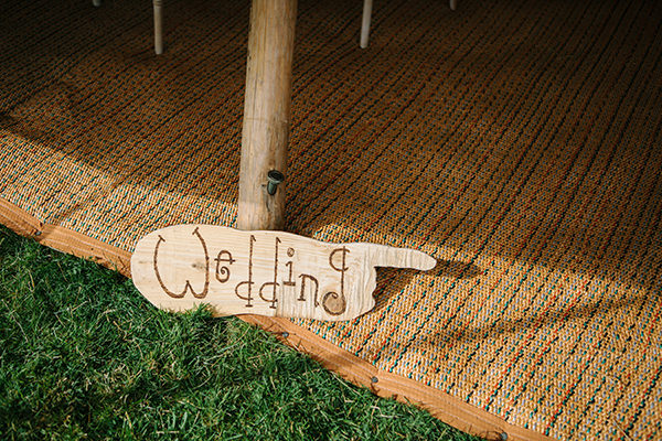 Bohemian Outdoor Tipi Wedding Wood Sign http://www.sarahjanesphotography.co.uk/