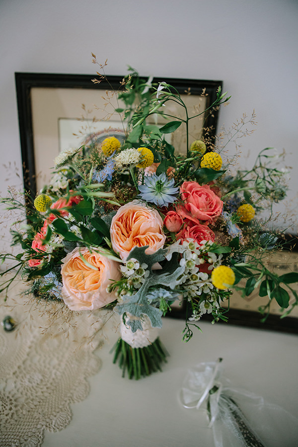 Bohemian Outdoor Tipi Wedding WIld Natural Bridal Bouquet Flowers Roses http://www.sarahjanesphotography.co.uk/ 