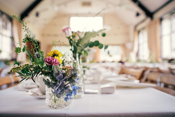 Colourful Homemade Village Hall Wedding Jar Flowers Wild http://hollydeacondesign.com/ 