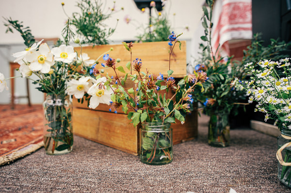 Colourful Homemade Village Hall Wedding Crates Jar Flowers http://hollydeacondesign.com/