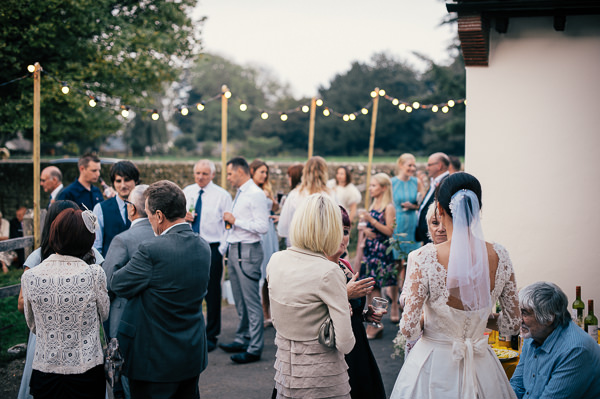 Festoon Lights Colourful Homemade Village Hall Wedding http://hollydeacondesign.com/ 