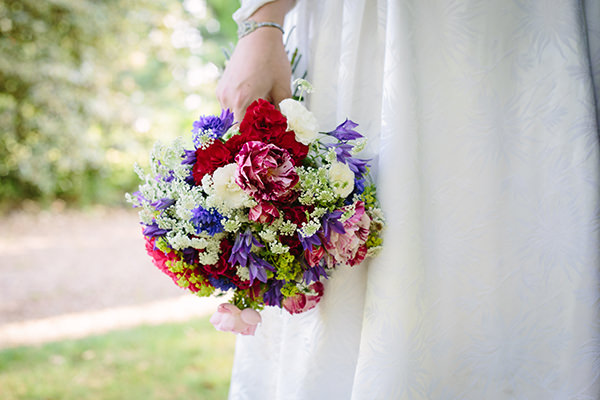 Colourful Outdoor Blooms Ribbons Wedding Ideas http://www.paperangelphotography.co.uk/ 