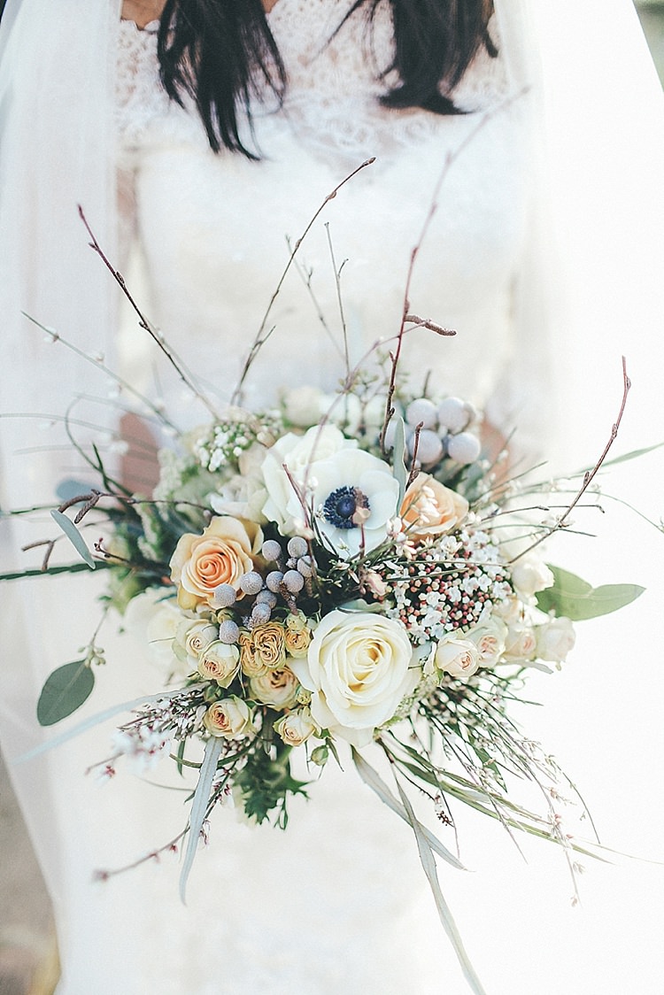 Bouquet Bride Bridal Flowers roses, spray roses, thistles, anemones, eucalyptus Whimsical Green White Fairy Lights Winter Wedding http://jesspetrie.com/