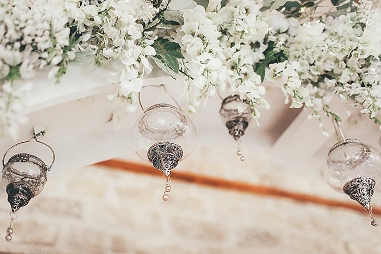 Flower Arch Ceremony Whimsical Green White Fairy Lights Winter Wedding http://jesspetrie.com/