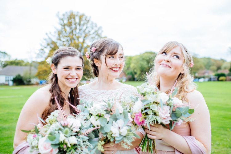 Bridesmaid Bouquets Pink Flowers Pretty Quirky DIY Village Hall Wedding http://lauradebourdephotography.com/