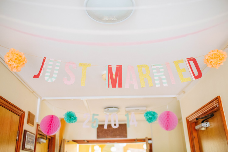 Just Married Hanging Sign Vintage Pretty Quirky DIY Village Hall Wedding http://lauradebourdephotography.com/