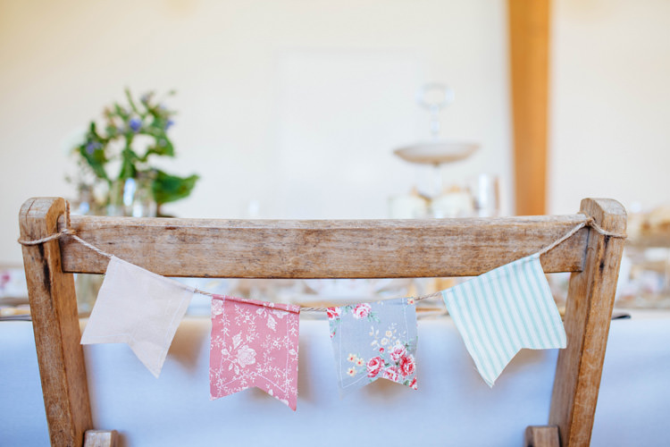 Bunting Chair Decor Pretty Quirky DIY Village Hall Wedding http://lauradebourdephotography.com/