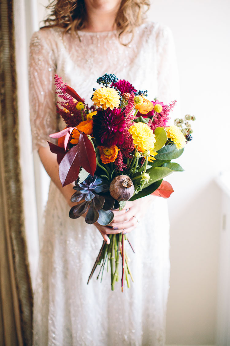 Autumn Flowers Bouquet Orange Red Yellow Dahlias Bride Bridal Cotswolds Barn Laid Back Stylish Wedding http://albertpalmerphotography.com/