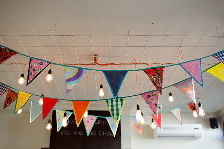 Bunting Festoon Lights Vibrant Quirky Colourful Spring London Wedding http://www.ireneyapweddings.com/