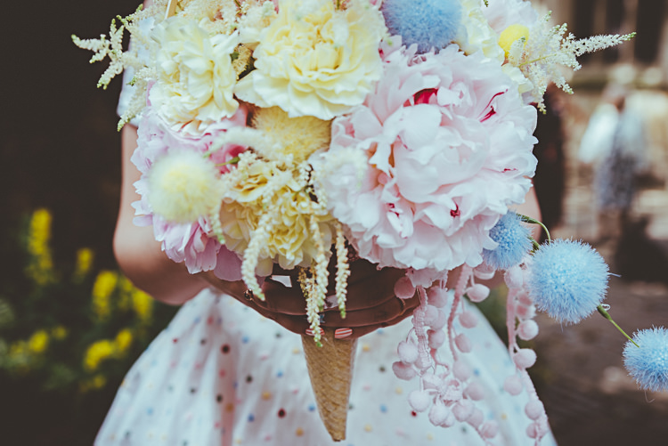 Ice Cream Cone Bouquet Flowers Bride Bridal Peony Pink Blue Yellow Pom Poms Back Garden Vintage Pastel Seaside Wedding http://photo.shuttergoclick.com/