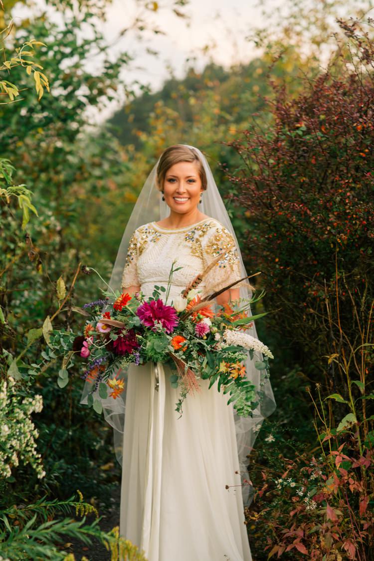 Large Bouquet Ferns Feathers Ribbons Flowers Bride Bridal Whimsical Peter Pan Inspired Wedding http://cararufenacht.com/