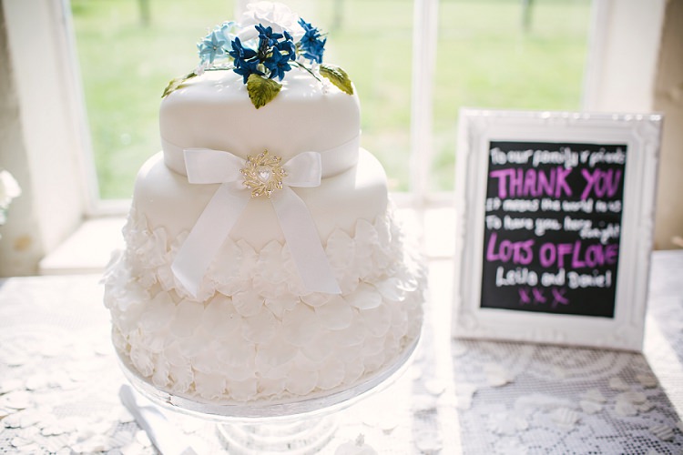 White Bow Cake Petals Vintage Village Hall Geek DIY Wedding http://www.theimagegarden.co.uk/