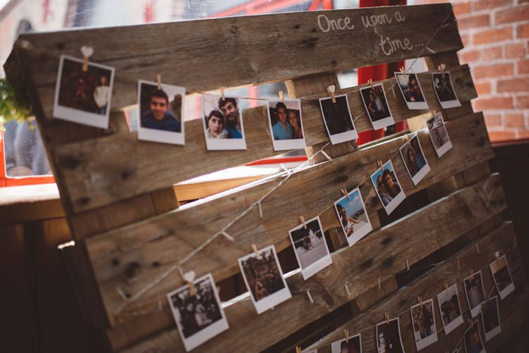 Photo Time Line Pallet Whimsical Boho Woodland Wedding http://katmervynphotography.com/