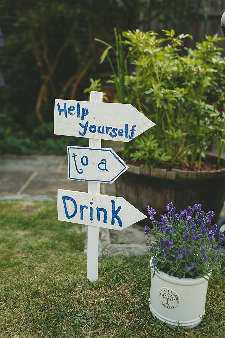 Drink Sign Wooden Post DIY Seaside Inspired Farm Wedding http://benjaminstuart.co.uk/