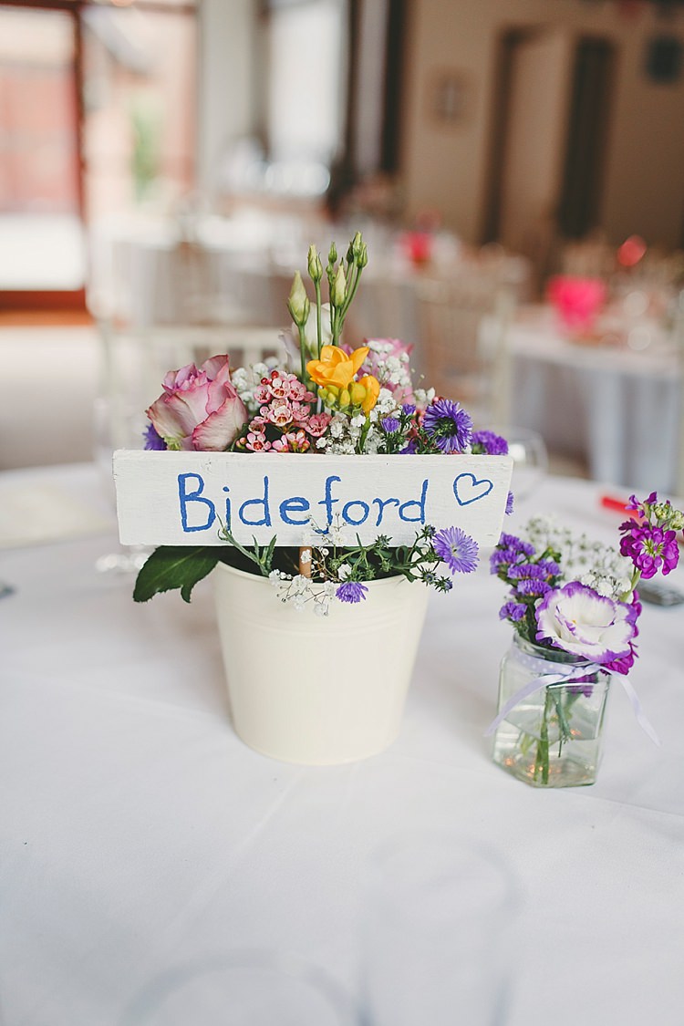 Bucket Flowers Centrepiece DIY Seaside Inspired Farm Wedding http://benjaminstuart.co.uk/