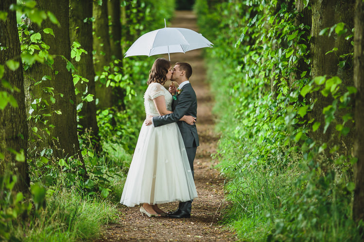 Rainy Umbrella Bride Groom DIY Orange Mint Conservatory Wedding http://www.tierneyphotography.co.uk/