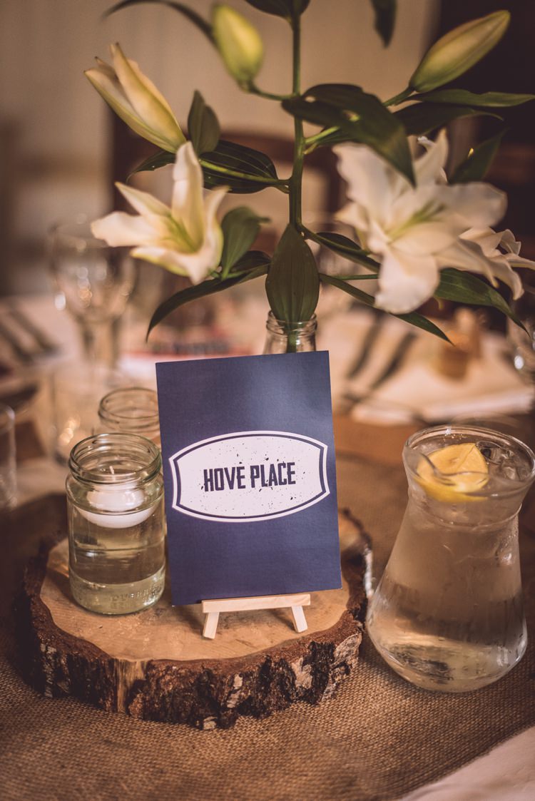 Log Bottle Lily Flowers Centrepiece Table Masculine Simple Rustic Pub Wedding http://www.neilwilliamshaw.co.uk/