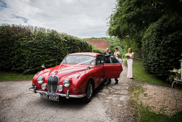 Classic Vintage Red Car Outdoor Lakeside DIY Wedding http://julietmckeephotography.co.uk/