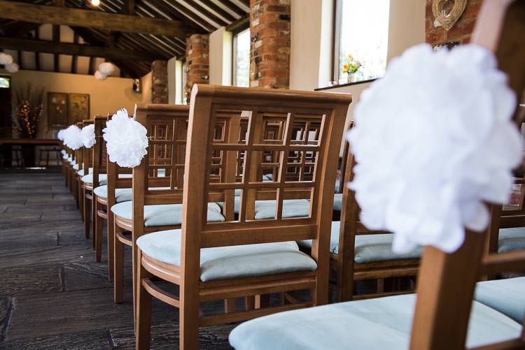 Chair Pom Pom Ceremony Aisle Pew Ends Pretty White Summer Informal Wedding http://www.jessicagracephotography.com/