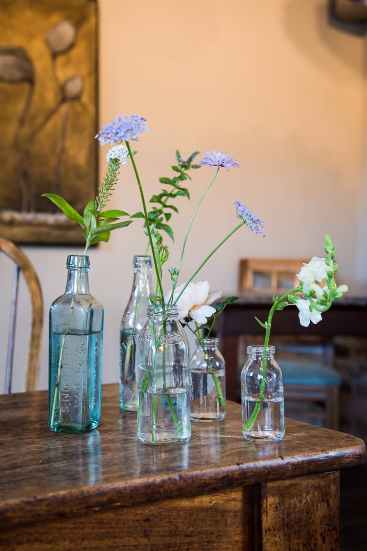 Bottle Flowers Pretty White Summer Informal Wedding http://www.jessicagracephotography.com/