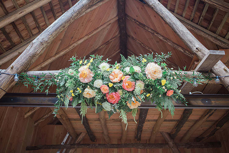 Ceremony Flower Arrangement Coral Peach Blooms Peonies Indie Hand Made Outdoor Woodland Wedding http://www.ilariapetrucci.co.uk/