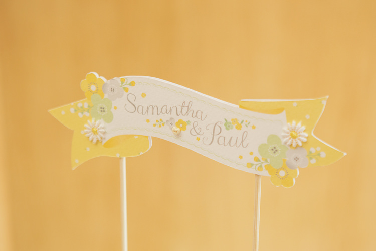 Floral Paper Cake Topper Banner Quirky Relaxed Yellow Country Wedding http://www.mr-and-mrs-wedding-photography.co.uk/