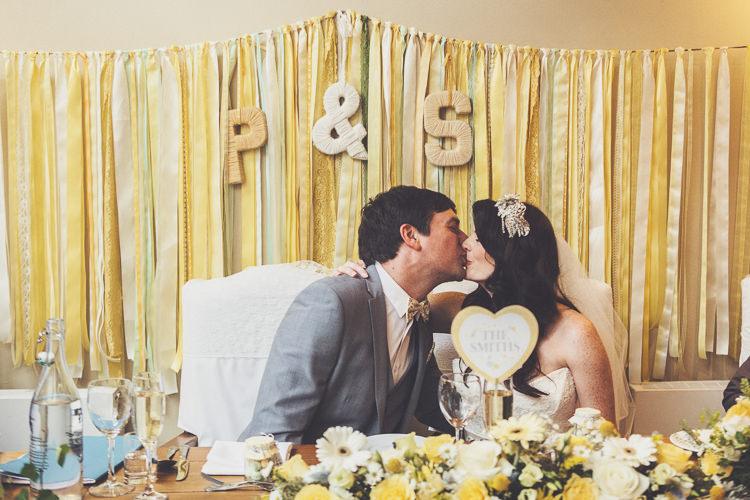 Ribbon Backdrop Letters Initials Quirky Relaxed Yellow Country Wedding http://www.mr-and-mrs-wedding-photography.co.uk/