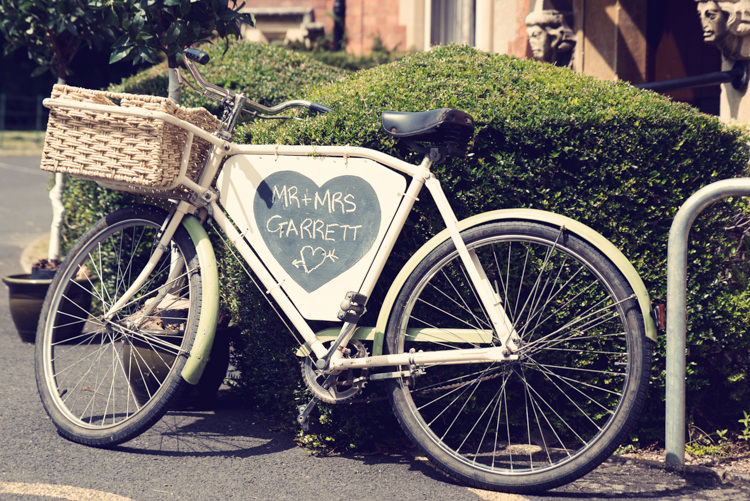 Bicycle Chalk Board Sign Classic Elegant Village Hall Wedding http://www.jessicaraphaelphotography.com/