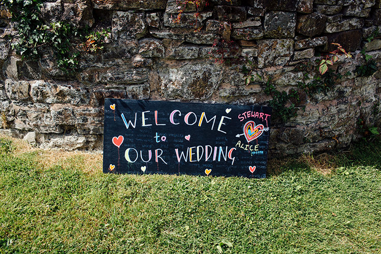 Colourful Blackboard Sign Welcome Woodland Farm Camping Weekend Wedding http://www.frecklephotography.co.uk/