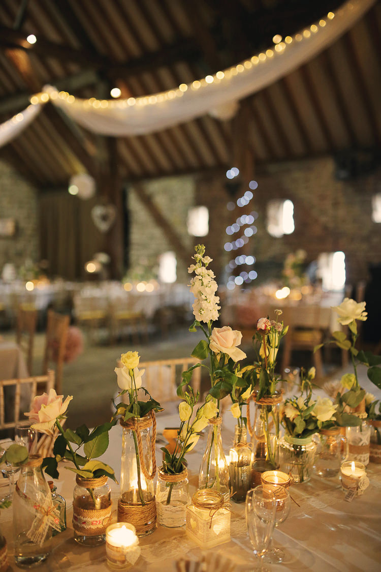 Candles Tea Lights Flowers Jars Stylish Pastel Rustic Barn Wedding http://helenrussellphotography.co.uk/ 