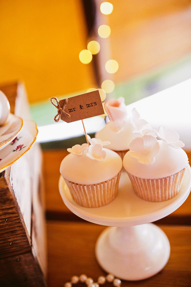 White Flower Cupcake Mr Mrs Topper Laid Back Tipi Wedding http://helenrussellphotography.co.uk/
