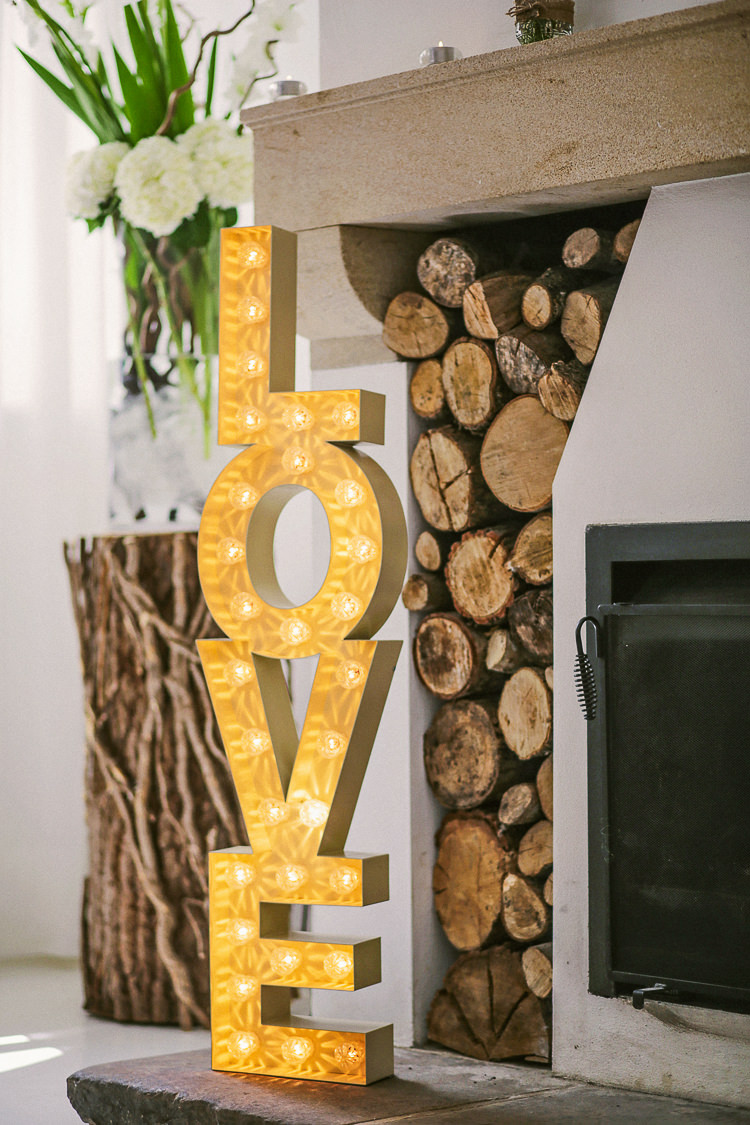 LOVE Light Letters Fireplace Rustic Laid Back Tipi Wedding http://helenrussellphotography.co.uk/