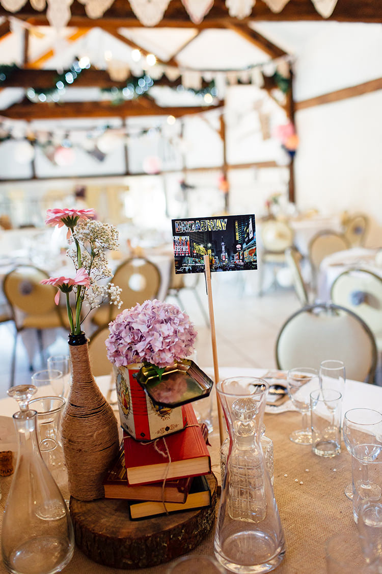 Book Flowers Bottle Centrepiece Twine Tin Log Hessian Home Made Rustic Eclectic Wedding http://www.frecklephotography.co.uk/