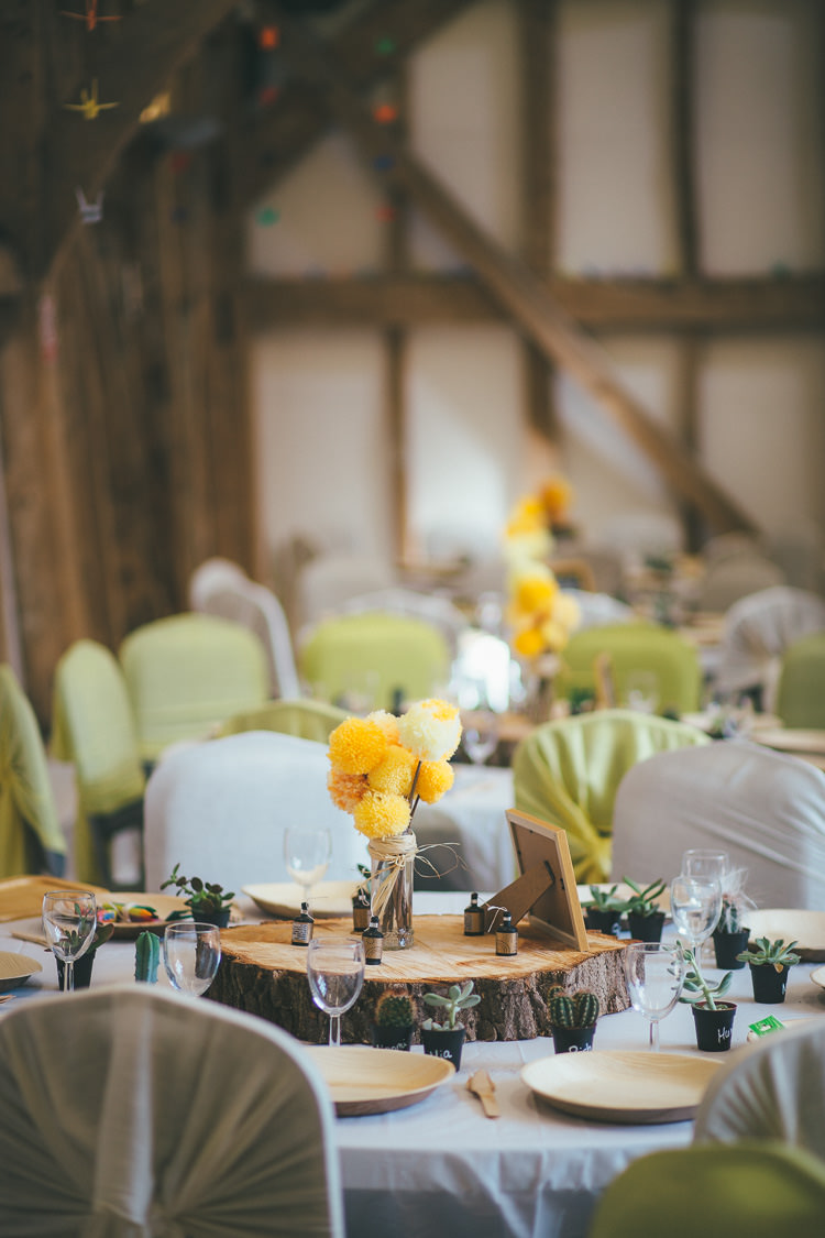 Pom Pom Wool Flowers Centrepiece Decor Jar Log Local DIY Yellow Barn Wedding http://www.brettsymesphotography.co.uk/