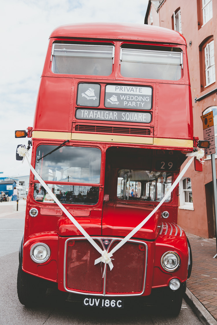 Red London Bus Durdle Door Cliff Wedding http://www.paulunderhill.com/