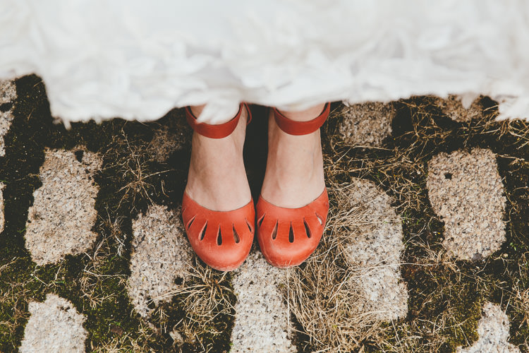 Clogs Bride Red Shoes Durdle Door Cliff Wedding http://www.paulunderhill.com/