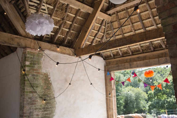 Festoon Lights Pom Poms Farm Barn Wedding http://www.florencefox.com/