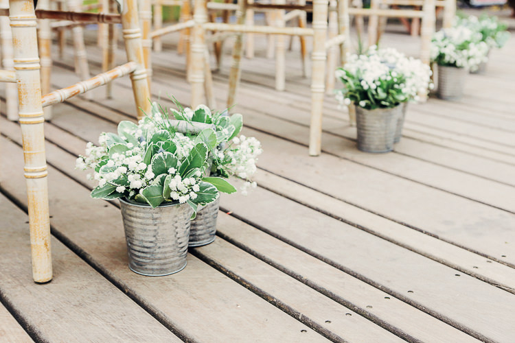 Silver Bucket Flowers Aisle Ceremony Chairs Rustic Treehouse Wedding http://helenrussellphotography.co.uk/