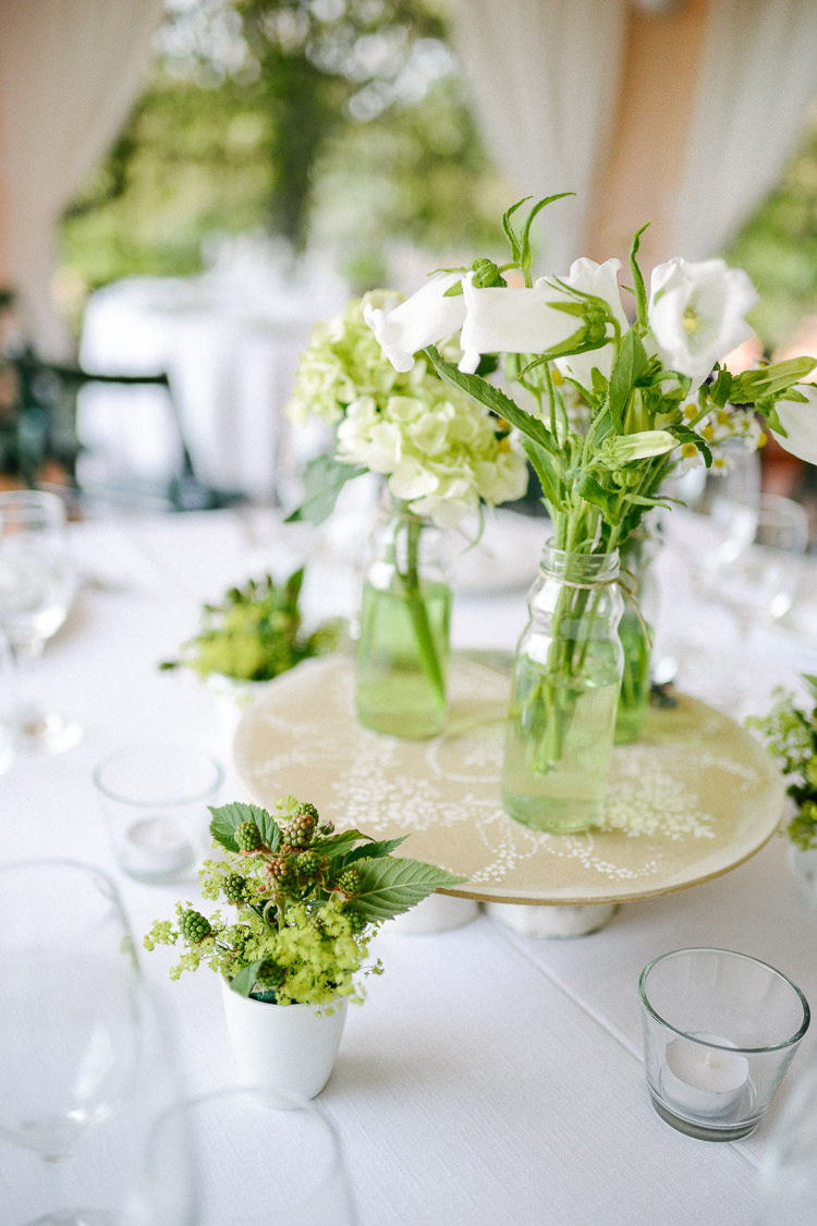 White Flowers Bottles Centrepiece Tables Intimate Italian Rose Garden Wedding http://landvphotography.it/