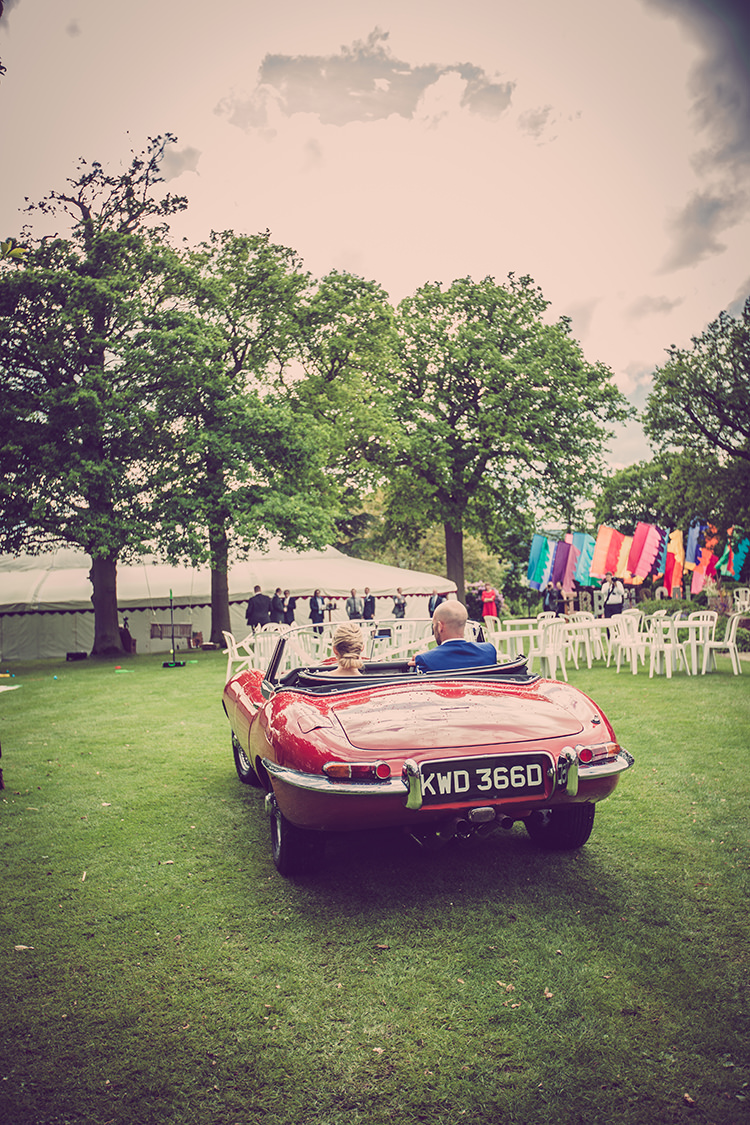 Classic Red Convertable Glastonbury Festival Garden Party Wedding http://www.tommyreynoldsweddings.co.uk/