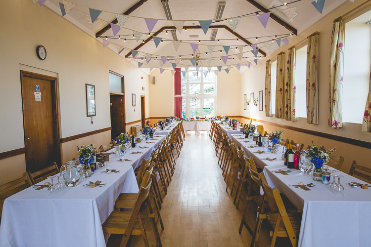 Long Tables Purple Bunting Festoon Lights Pretty Home Made Country Village Hall Wedding http://www.alexapoppeweddingphotography.com/