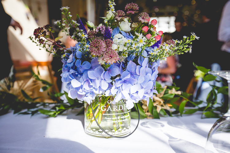 Jars Flowers Blue Purple Pretty Home Made Country Village Hall Wedding http://www.alexapoppeweddingphotography.com/
