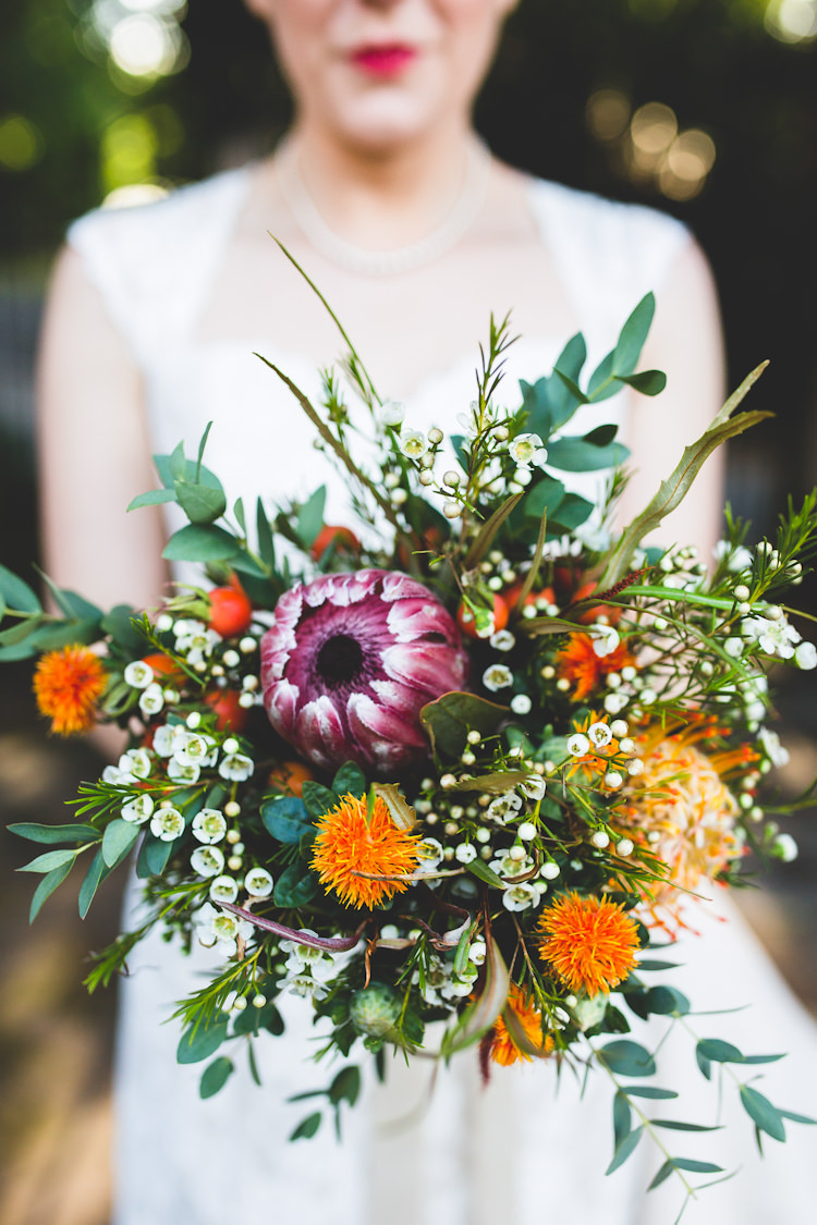 Wax Flower Bouquet Protea Orange Purple Autumn Kentish Village Hall Wedding http://www.livvy-hukins.co.uk/