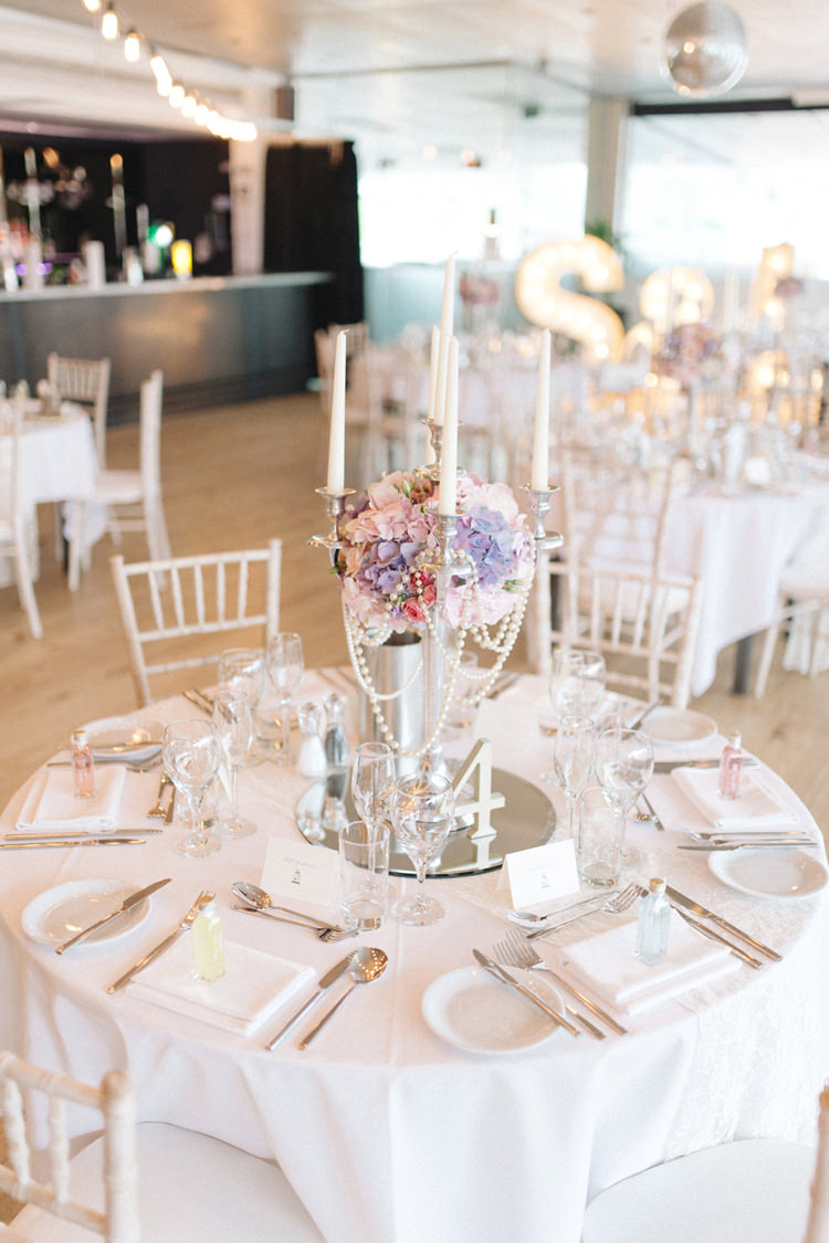 Candleabra Centrepiece Decor Tables Pearls Flowers Chic Pastel City Wedding http://sarahjaneethan.co.uk/