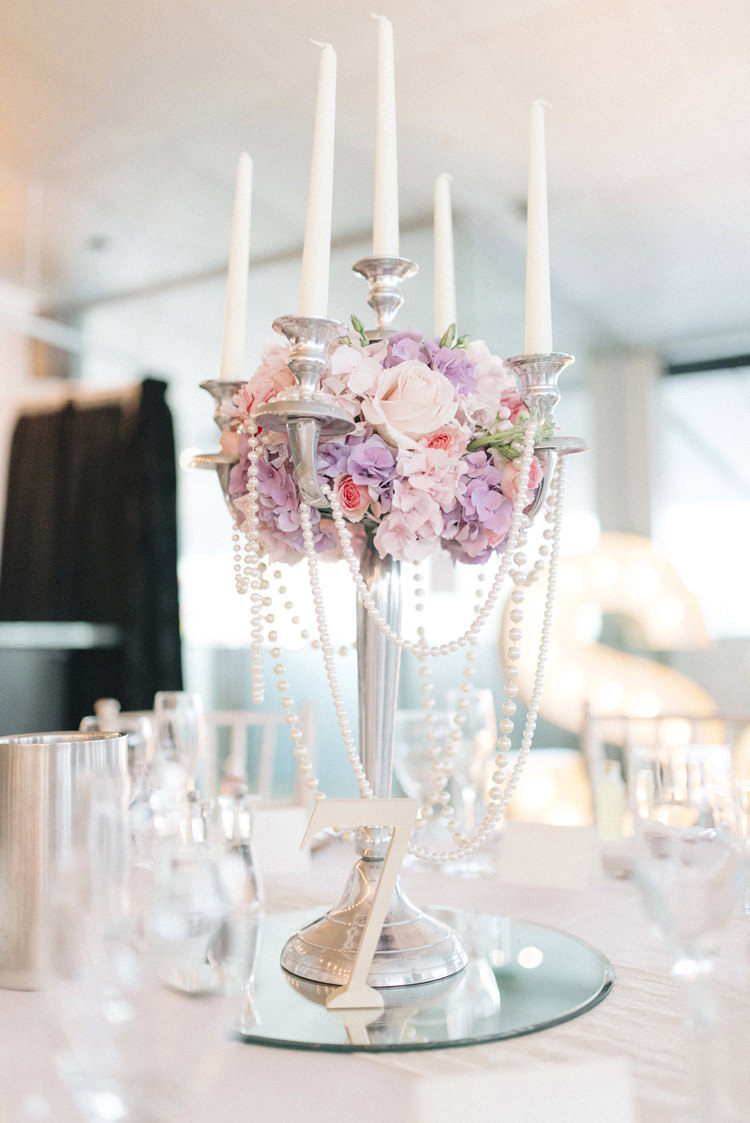 Candleabra Centrepiece Decor Tables Pearls Flowers Chic Pastel City Wedding http://sarahjaneethan.co.uk/