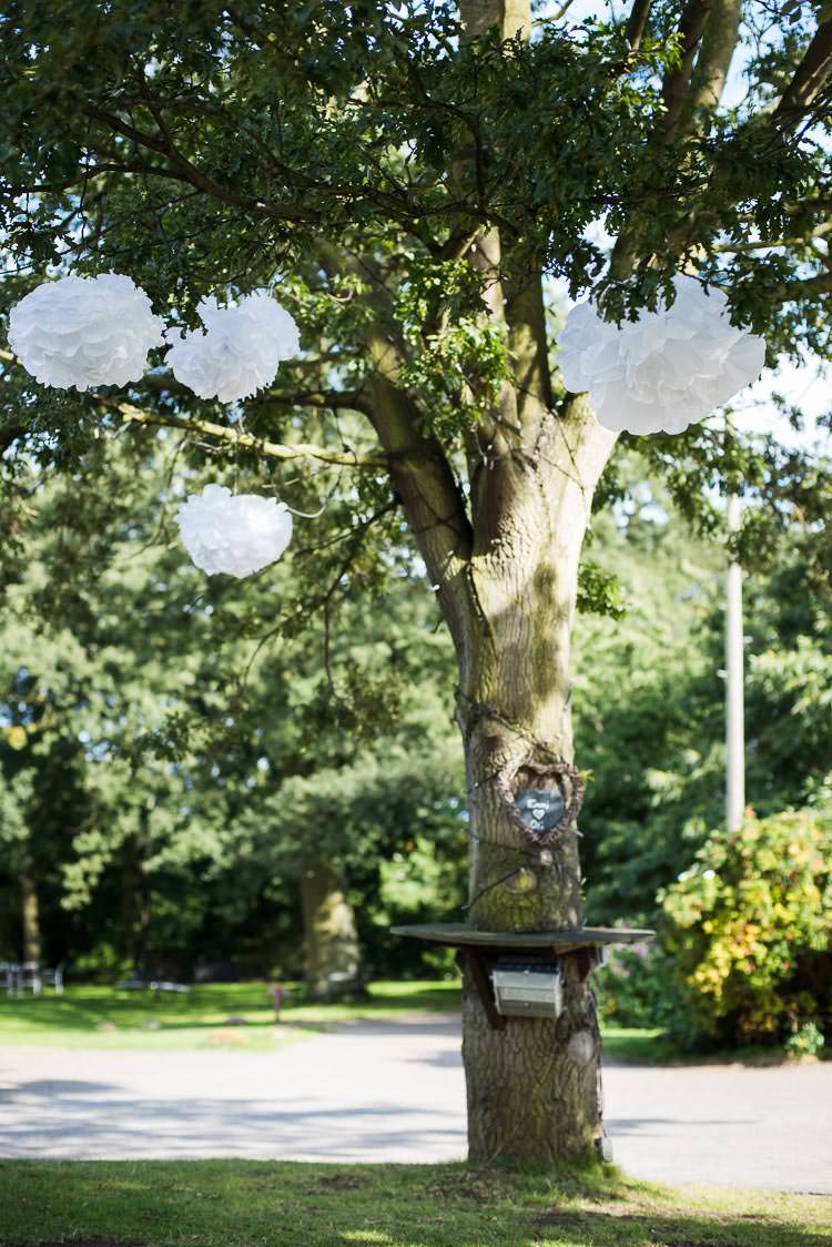 Pom Pom Wedding Ideas Hanging Outdoor Trees http://www.jessicagracephotography.com/